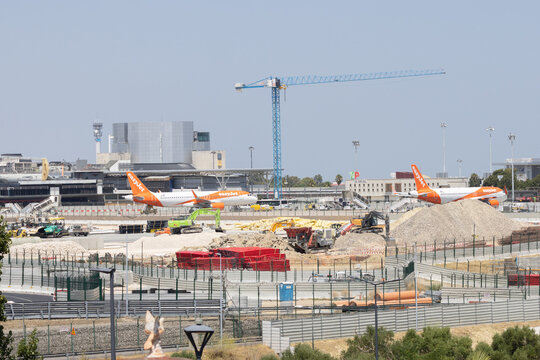 Lisbon humberto delgado airport expansion construction with easyjet planes
