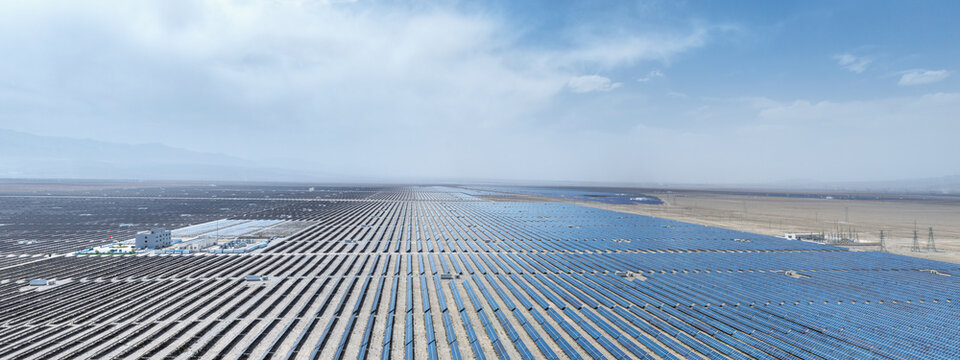 Aerial Panorama of Vast Solar Power Station in Desert Landscape