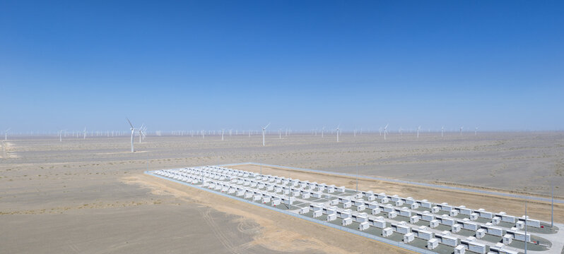 Aerial View of Energy Storage Power Station with Wind Turbine Array in Gobi Desert