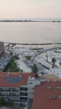 Vertical Aerial View of Lefkada Town Marina and Lagoon at Sunset in Greece