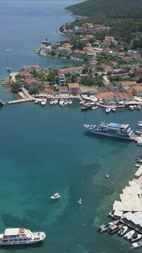 Vertical Aerial View of Fiskardo Village Port and Boats in Kefalonia Greece
