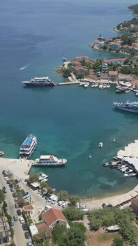 Vertical Aerial View of Fiskardo Village Port and Boats in Kefalonia Greece
