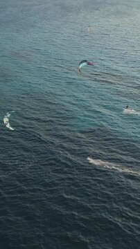 Vertical Aerial View of Kitesurfers Flying Kites over Agios Ioannis Beach in Lefkada Greece