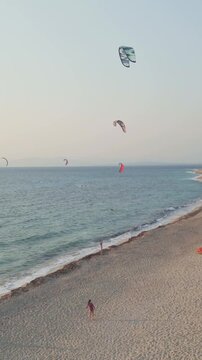 Vertical Aerial View of Kitesurfers Flying Kites over Agios Ioannis Beach in Lefkada Greece