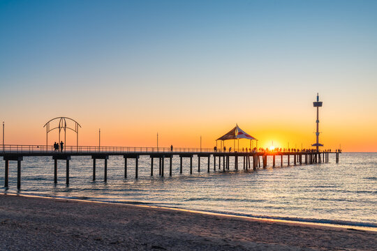 Brighton Beach Jetty at sunset with people silhouettes, Adelaide, South Australia