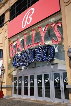 Atlantic City, New Jersey, U.S.A - Aug 16, 2026 - Bally&rsquo;s Hotel and Casino entrance doors features bold red signage and branding emphasizing its historic tradition and elegant presentation.