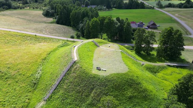 Prelomciskes hillfort mound on a shore of Dusia Lake, Meteliai Regional Park, Lithuania