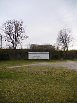 Small shed sits in a grassy field