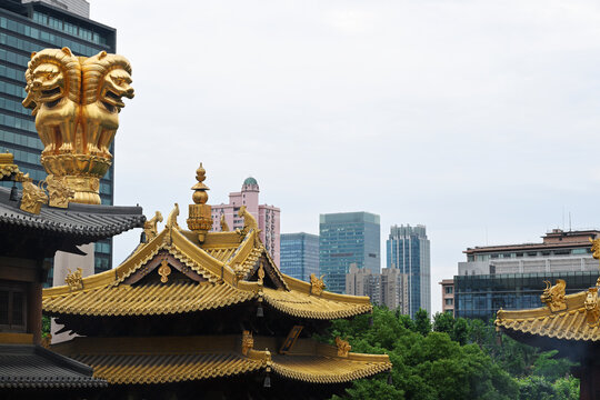 Ancient chinese temple against a modern skyscraper