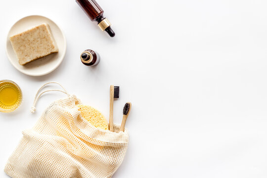 Self-care with herbal formulations - essential oils and soap - on white background top view copy space