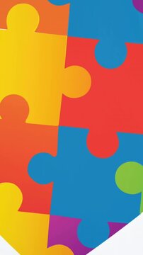 Animation of multi coloured puzzle pieces and heart over white background