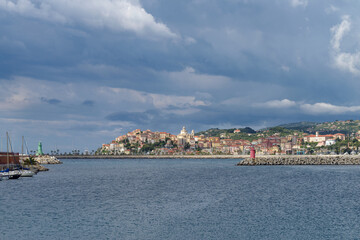 Fototapeta premium Italian Riviera. Imperia old town, view from the sea on a rainy day
