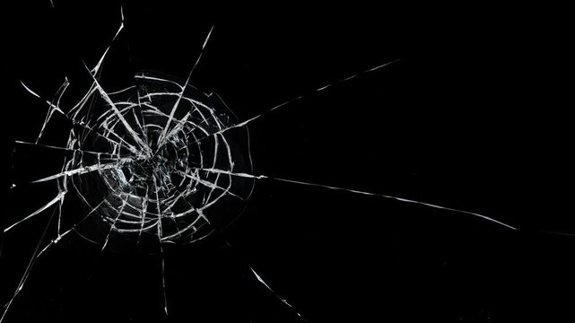 Cracked glass fracture effect on black background, Glass breaking into pieces. Realistic Glass impact crack, Broken cracks glass fracture effect texture isolated abstract black background. 