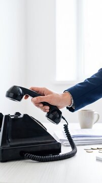 Businesswoman or picking or hanging up handset
