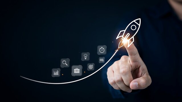 Rocketship launching, symbolising startup and growth, with technology icons trailing behind. A finger is touching the launch point, indicating initiation and progress