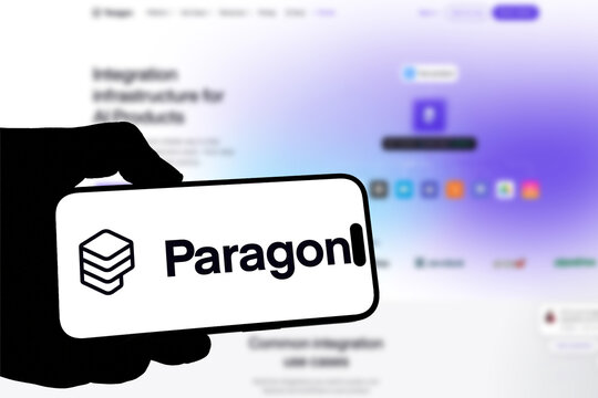 Kiel, Germany - 08-19-2026: Smartphone displaying US embedded integrations software company Paragon logo in front of companys webpage