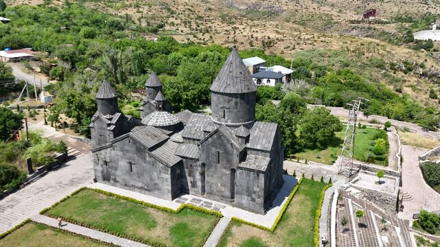 Cinematic drone footage of the historic Tegher Monastery (Tegher Vank) located in Aragatsotn Province, Armenia. The 13th-century stone churc
Aerial Drone View of Tegher Monastery in Aragatsotn Armenia