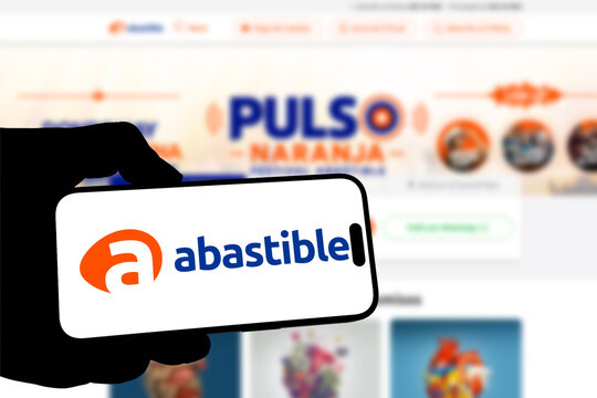 Kiel, Germany - 08-19-2026: Smartphone displaying Chilean liquefied petroleum gas company Abastible logo in front of companys webpage