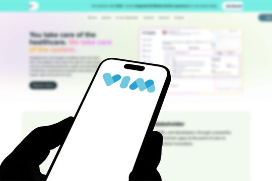 Kiel, Germany - 08-19-2026: Smartphone displaying US healthcare software company Vim logo in front of companys webpage