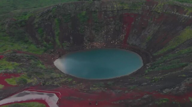 Aerial view of Kerid volcanic crater and blue lake in