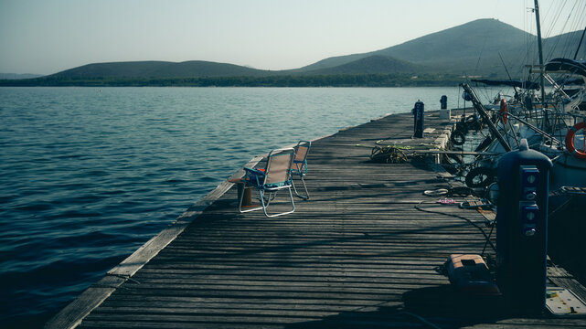 deck chair on pier in the port