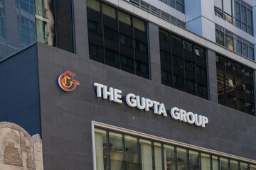 Fototapeta premium Toronto, ON, Canada - August 17, 2026: The Gupta Group logo and sign on the building in Toronto, ON, Canada. The Gupta Group is a major Canadian real estate development and management company. 