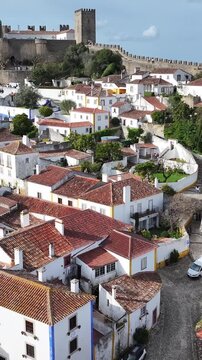 Obidos Skyline In Obidos Leiria Portugal. Medieval Building In A Bustling City Viewed From Above. Urban Backgrounds. Downtown Cityscape. Obidos Leiria.