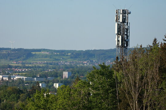 A tall tower with a cell phone antenna on top