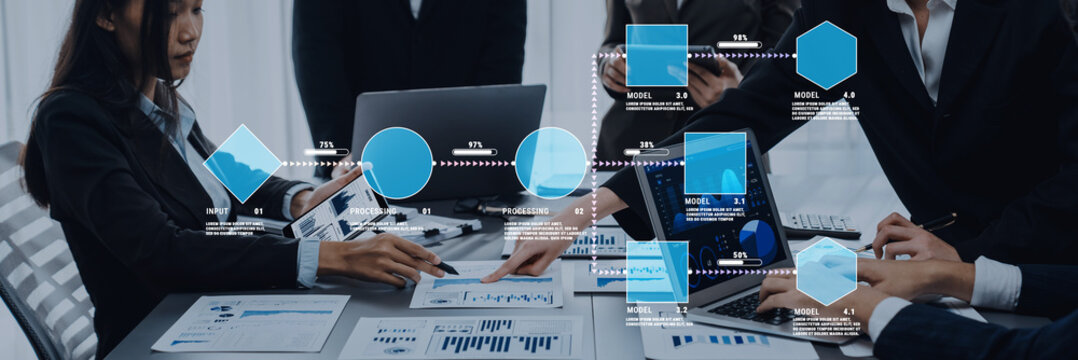 Business team collaborating on data analysis and presentation with charts and graphs, using laptops and tablets in a modern office environment Quark.