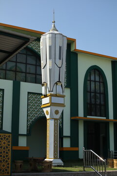Folded giant umbrella column stands in the courtyard of the Sabilit Taqwa Mosque in Bululawang, Malang.