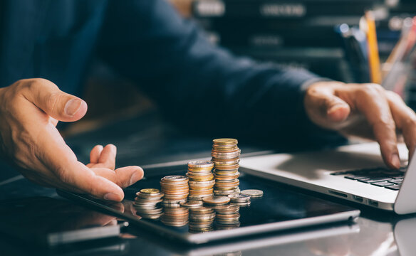 Selective focus.Financial planning management.Smart investment with coin stack