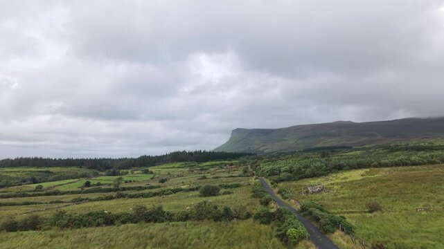 Benbulben Mountain Above Sheep Pastures and Country Road in Sligo, Ireland