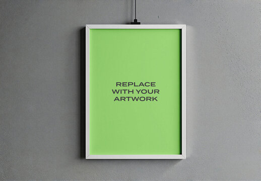 Vertical framed poster mockup with placeholder content displayed on a textured gray wall, realistic art presentation hanging cable, interior design display, graphic template