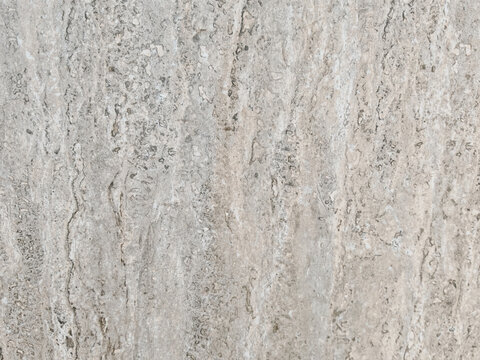 High-resolution overhead shot of beige travertine marble stone texture featuring vertical veining and pitted detailing. Target audience includes interior designers, architectural mappers, 3D artists, 