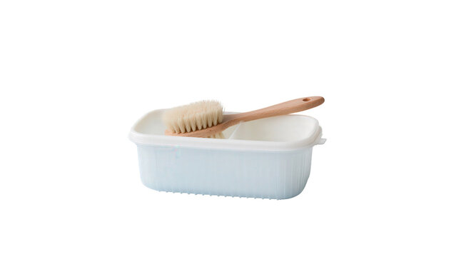 Blue plastic container with wooden scrub brush with plastic tub on transparent background