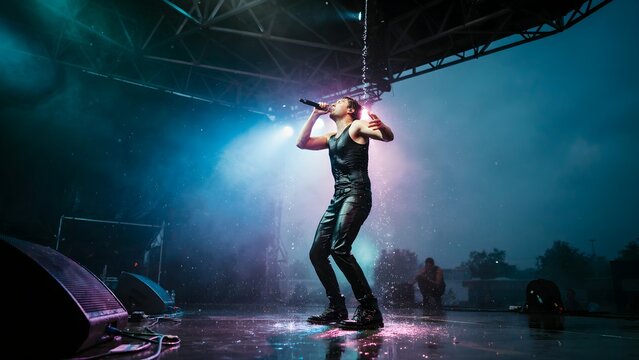 Dynamic Performance of a Solo Singer Under Rainy Stage Lights