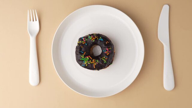 Chocolate Donuts Stacked on White Plate