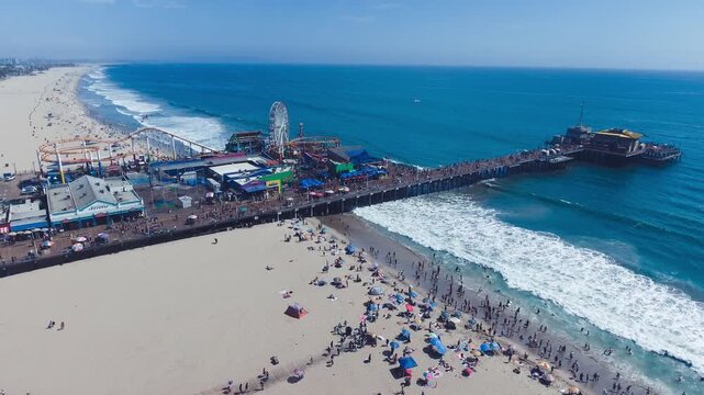 SANTA MONICA, CA - AUGUST 2017: City Pier and Beach. Aerial view from drone in slow motion