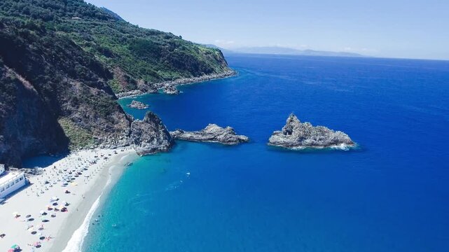 Aerial view of rock of the ulivarella, Tonnara di Palmi, Calabria, Italy. Slow motion