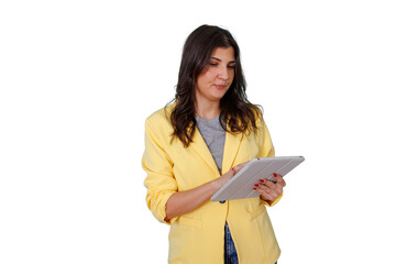 Woman in yellow blazer using digital tablet for business communication, managing online data, and professional work with a transparent background © Komora