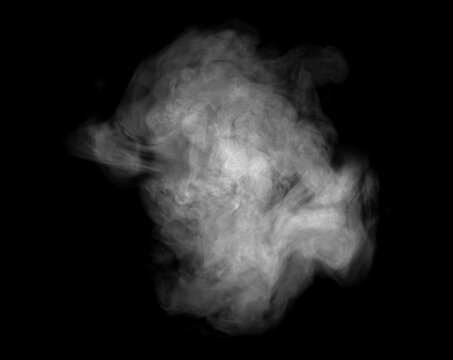Abstract gray smoke cloud floating on a deep black background, featuring soft swirling particles dramatic monochrome tones, atmospheric texture, mysterious energy, and ample negative space for design.