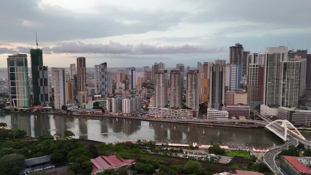 Binondo Chinatown Pasig River near Intramuros Manila Philippines Urban development and city growth in Intramuros Manila Philippines with an aerial view the modern skyline and a river