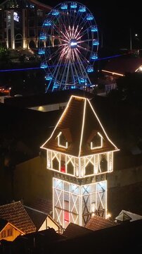 Capivari Village In Campos Do Jordao Sao Paulo Brazil. Breathtaking Aerial View Of Famous Ferris Wheel Of The City. Night Illuminated Skyline. Cities Of The World Landscape.