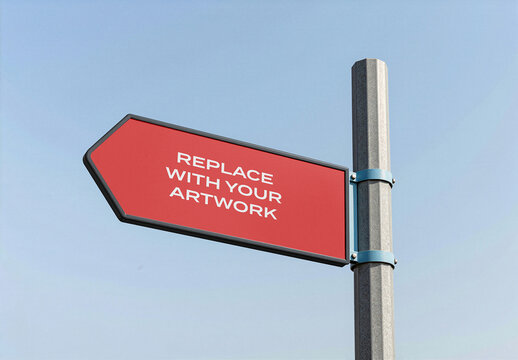 Directional sign mockup mounted on a metal pole against clear blue sky, realistic outdoor signage presentation with placeholder text for branding, advertising, or informational display