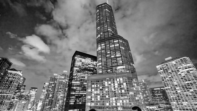Chicago, IL - July 25, 2024: Skyward view of Downtown Chicago Skyscrapers at summer night