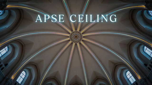 Low angle view of a beautiful arched cathedral apse ceiling with architectural details