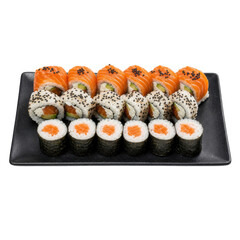 Freshly prepared salmon sushi rolls and maki with avocado and sesame seeds on a black plate © Chinases