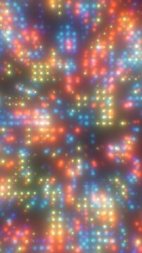 Colorful glowing bokeh lights in orange, blue, yellow, and red create a vibrant blurred background with a festive digital atmosphere.
