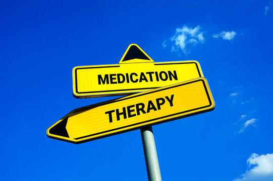 Medication vs Therapy -  Traffic sign with two options - mental health and choosing between psychology treatment and pharmacotherapy. 