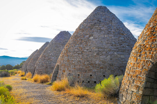 Historic trail past stone Ward Charcoal Ovens at sunset